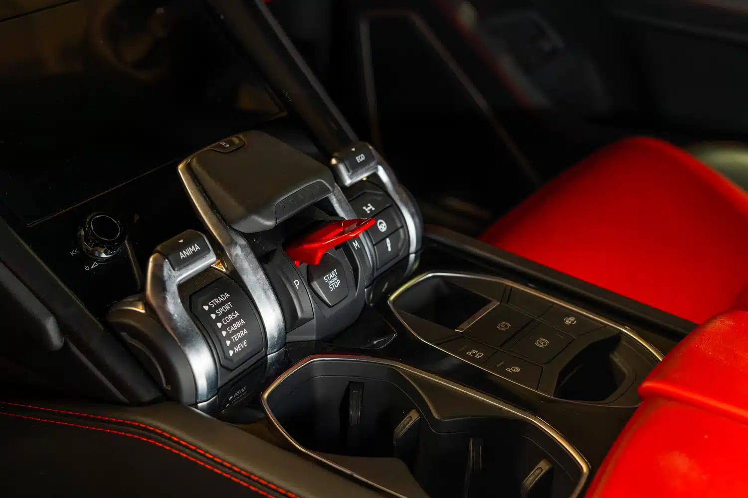 Close up of the mode selector on the centre console within a 2021 Lamborghini Urus V8 Auto