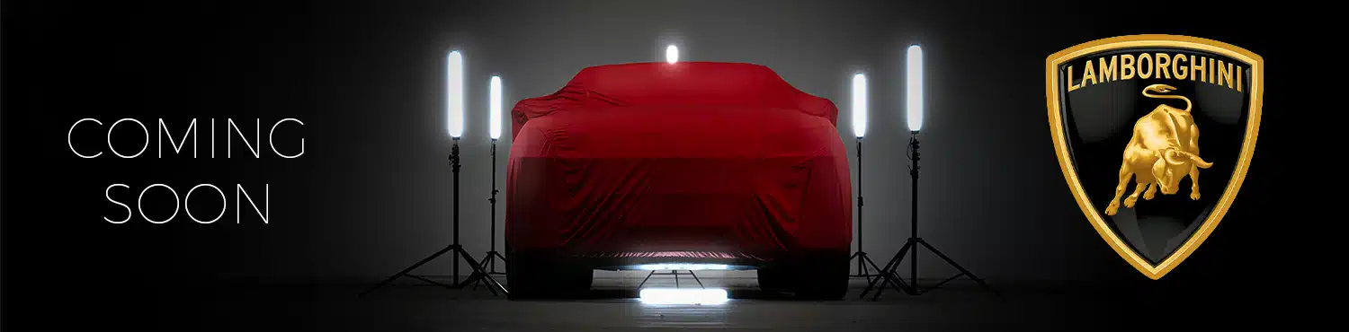Lamborghini Urus – Landing Page Banner V2 2021 Lamborghini Urus V8 Auto Shrouded in a red cover surrounded by cool white strip lights